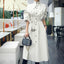 Mid-length windbreaker dress with waist