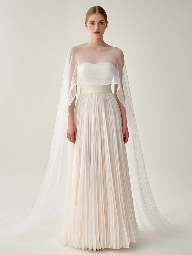 Elegant White Pleated Gown With Sheer Cape Overlay Hover Image