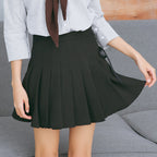 Pleated skirt with bow tie