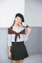 Pleated skirt with bow tie