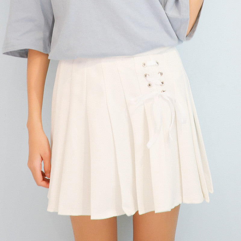 Pleated skirt with bow tie