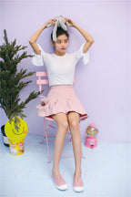 Pleated skirt with bow tie