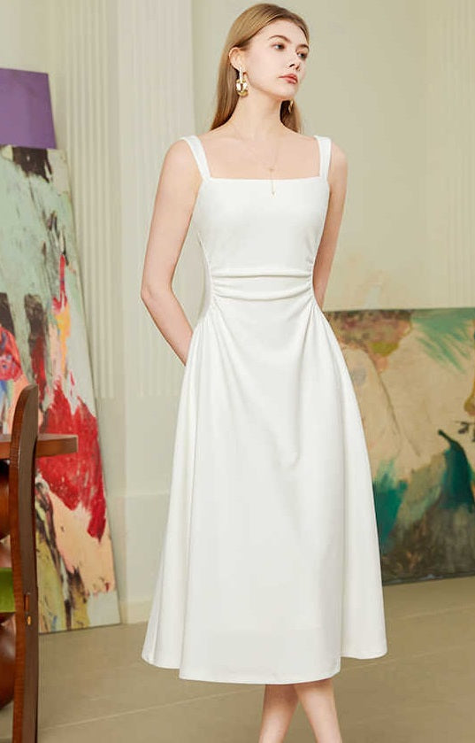 New High Sense French Style Temperament White Suspender Dress