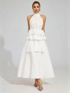 Flowy Ruffled Wedding Dress With A Halter Neckline